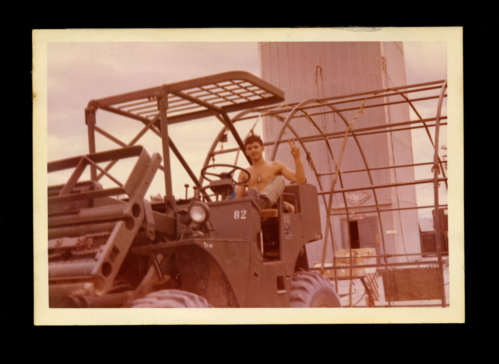 37_Soldier on vehicle gives peace Sign, found photo, 5.75 x 7 inch, 2006